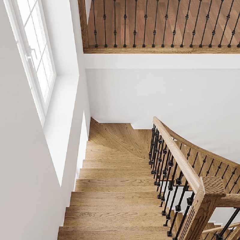 Г-образная лестница с радиусным поворотом и дубовыми ступенями