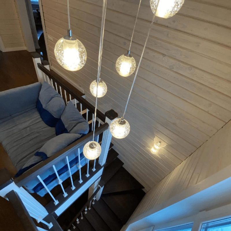 Трехмаршевая лестница с поворотом на 180 со ступенями из ясеня